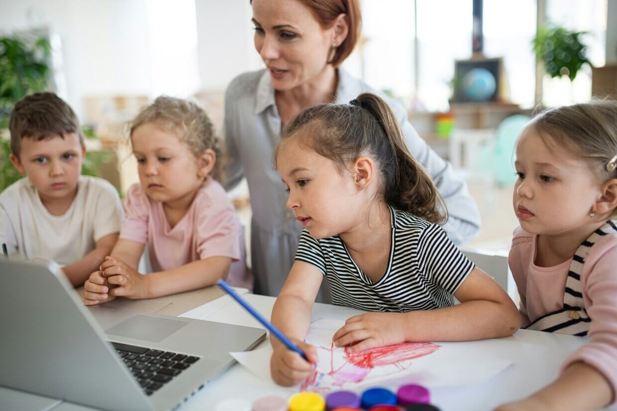 Children using laptops in the classroom